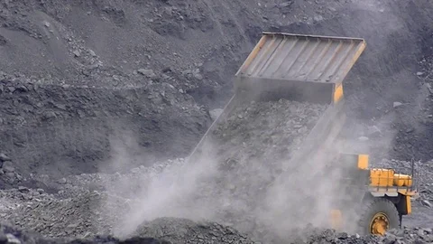 Dump truck throws out rock. coal producer. Stock Footage 129919149