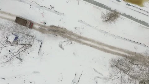 A dump truck transporting ground on winter Stock Footage 169323867