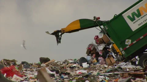Dump truck unload trash and waste onto landfill 1080p  Stock Footage 44246348