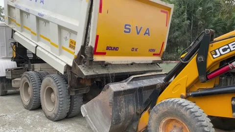 Dump truck unloading stone chips for road construction Video stock 167698550