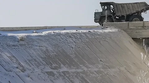 Dump truck unloads limestone. Stock Footage 63545544