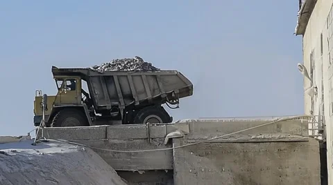 Dump truck unloads limestone. Stock Footage 63545557