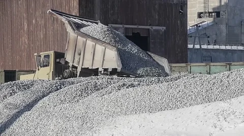Dump truck unloads limestone. Stock Footage 63545574