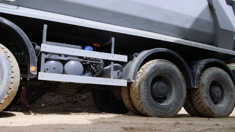 Dump Truck Wheels Move Backwards At Job Site Stock Footage 88698075