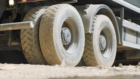 Dump Truck Wheels Move Backwards At Job Site Stock Footage 88699516