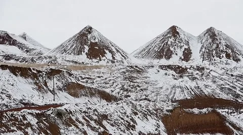 Dump Trucks carry ore. Winter Vídeo Stock 63545323