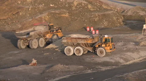 Dump Trucks on Dirt Road Video stock 42152459