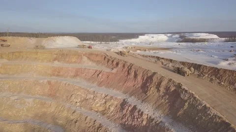 Dump trucks in the gold mining quarry. Drone view Stockbeeldmateriaal 136183518