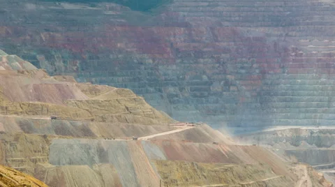 Dump trucks in huge surface level mine quarry pit Stock Footage 57275296