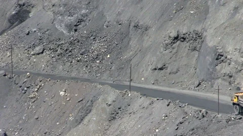 Dump trucks in open cast mine Stock Footage 131418022