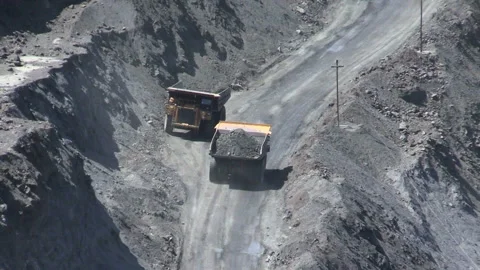 Dump trucks in open cast mine Stock Footage 131418040
