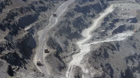 Dump trucks in open cast mine Stock Footage 131418046