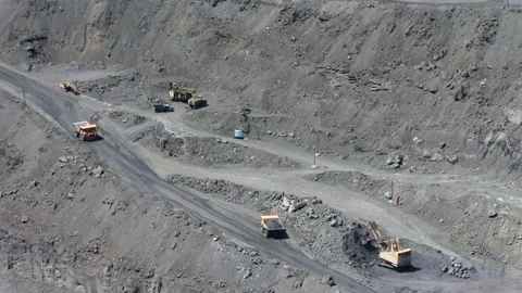 Dump trucks in open cast mine Stock Footage 131418386