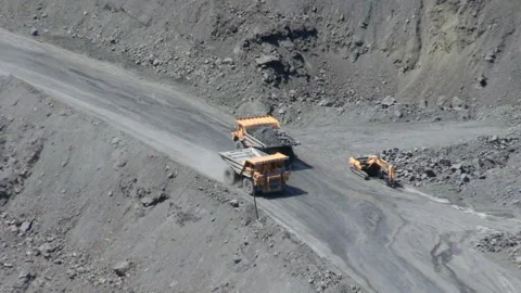 Dump trucks in open cast mine Stock Footage 131418569