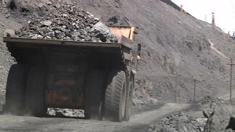 Dump trucks in open cast mine Stock Footage 132698540