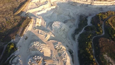 Dump trucks work on a sandstone quarry Stock Footage 161800511
