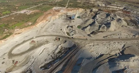 Dump Trucks Working at Mining Pit,Aerial Stock Footage 74289052
