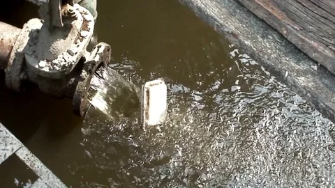 Dump waste organic and plastic in water sewage river trash pollution rubbish Stock Footage 334644658
