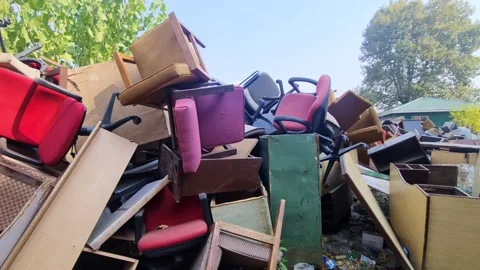 Dumped Broken chairs are abandoned in outdoor in indian government offices. D Stock Footage 165648716