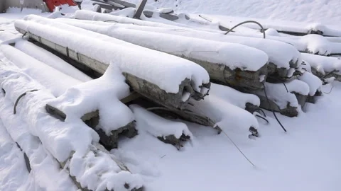 Dumped pillars in slow motion covered with snow Video stock 147655178