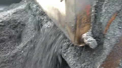 Dumping Black Tar into Asphalt Machine Video stock 12577857