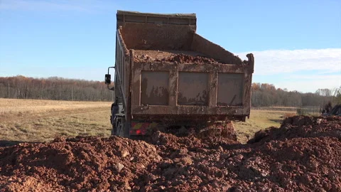 Dumping Dirt or Dump Truck 1 Stock Footage 239646474