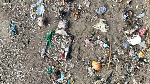 Dumping of garbage plastic in sea beach ocean wrong area composting Philippin Stock Photos