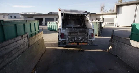 Dumping Trash From Garbage Truck Stock Footage 125365408