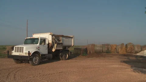 Dumping Truck and Tractor Stock Footage 57227677