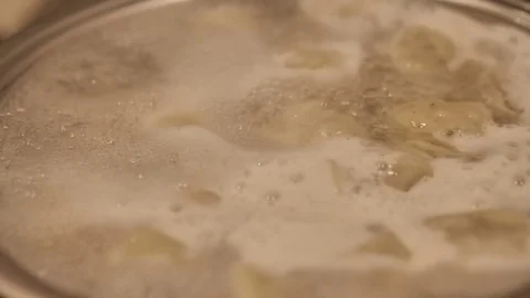 Dumpling cooking in boiling water. Meat Dumplings Stock Footage 82860055