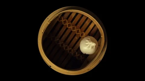 Dumpling Dim Sum Stop Motion basket full to empty on black background Video stock 125841020