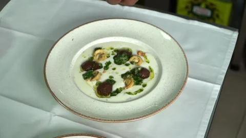 Dumpling Dish with Cream Sauce Stock Footage 318310270