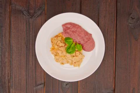 Dumplings with acidic cabbage on a table Foto stock