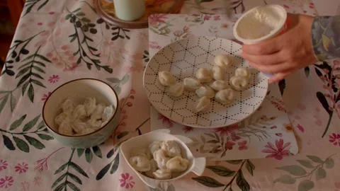 Dumplings Are Being Served with a Rich and Creamy Delicious Sauce Vídeos de archivo 318924467