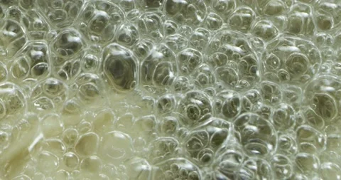 Dumplings are boiled in pot with boiling water with spices and spin on closeup Video stock 152094372