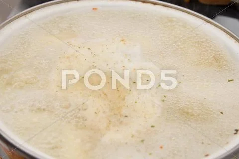 Dumplings are boiled in a pot Stock Photos