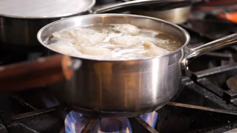 Dumplings are boiling in a restaurant 库存影片 203898086