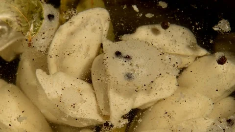 Dumplings with bay leaf and black pepper Stock Footage 291606369