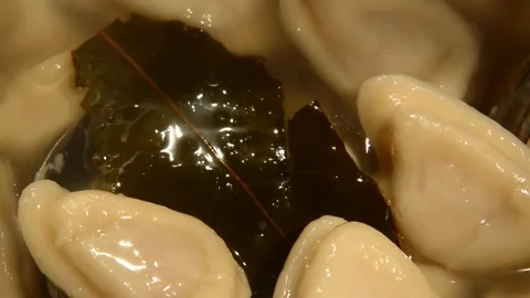 Dumplings with bay leaf Stock Footage 291548485