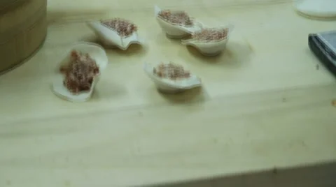 Dumplings being hand made in Beijing, China. 2 Stock Footage 5162379