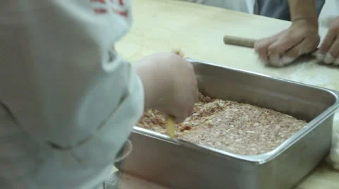 Dumplings being hand made in Beijing, China. 2 Stock Footage 5162720