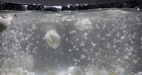 Dumplings in a boiling water in a transparent pot. Chinese cuisine, food Stock Footage 259842416