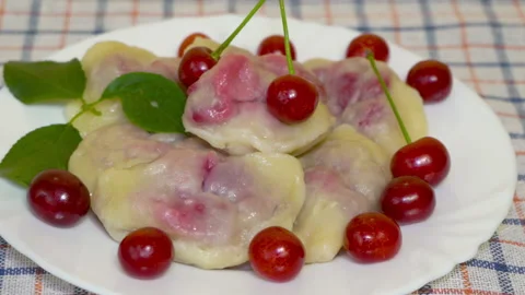 Dumplings with cherries Stock Footage 143163977