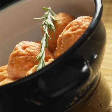 Dumplings from cod a la salmon Stock Photos