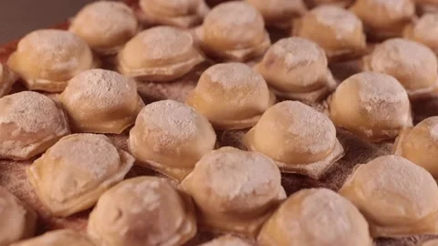 Dumplings on a cutting board in a turn. Stock Footage 170488943