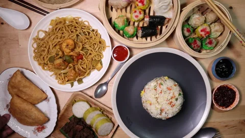 Dumplings dim sum bamboo steamer egg fried rice pulut lemang beef rendang stair  Stock Footage 155284050