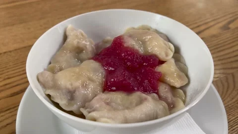 Dumplings filled with cherries and jam on the top. Vidéo 219573249