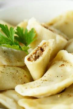 Dumplings, filled with mashed potatoes and liver. Russian, Ukrainian or Polis Stock Photos