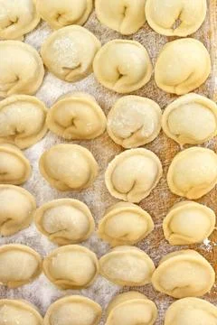 Dumplings on the kitchen board Stock Photos