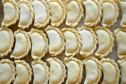Dumplings on the kitchen board Stock Photos